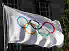 The Olympic flag waves during the International Olympic Committee meeting in London on April 6, 2011.