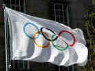 The Olympic flag waves during the International Olympic Committee meeting in London on April 6, 2011.