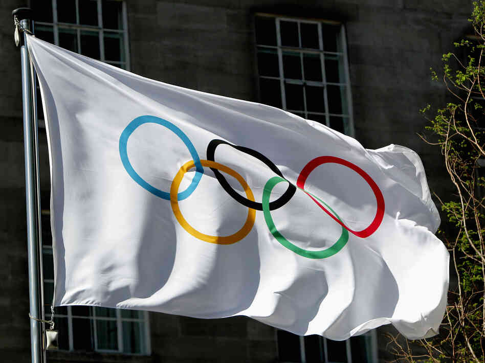 The Olympic flag waves during the International Olympic Committee meeting in London on April 6, 2011.