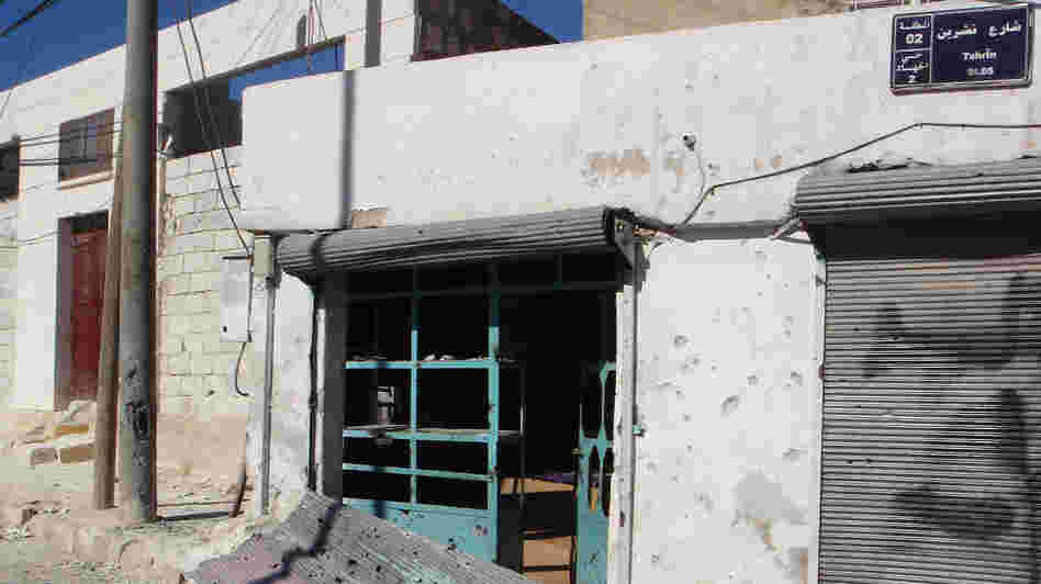Most civilians have fled the Syrian town of Derat Azza after protracted shelling by Syrian troops. Shops are closed, and  rebels are trying to tightly control any information flowing out of the town.