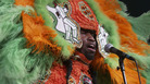A Mardi Gras Indian performs at the 2008 Voodoo Music Experience festival, held in New Orleans City Park. A Mardi Gras Indian performs at the 2008 Voodoo Music Experience festival, held in New Orleans City Park.