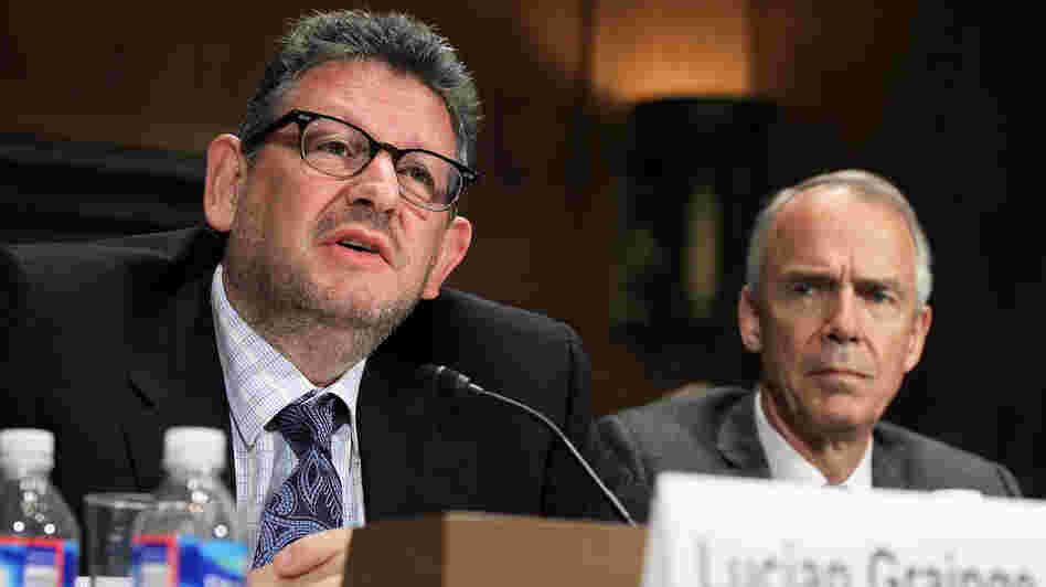 Chairman and CEO of Universal Music Group Lucian Grainge (left) and Roger Faxon, the CEO of EMI Group, testify during a Senate Judiciary subcommittee hearing on Universal's proposed merger with EMI.