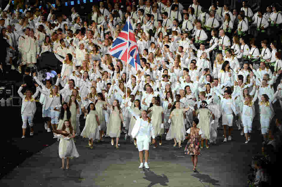 Sir Chris Hoy of the Great Britain Olympic cycling team carries his country's flag during the opening ceremony.
