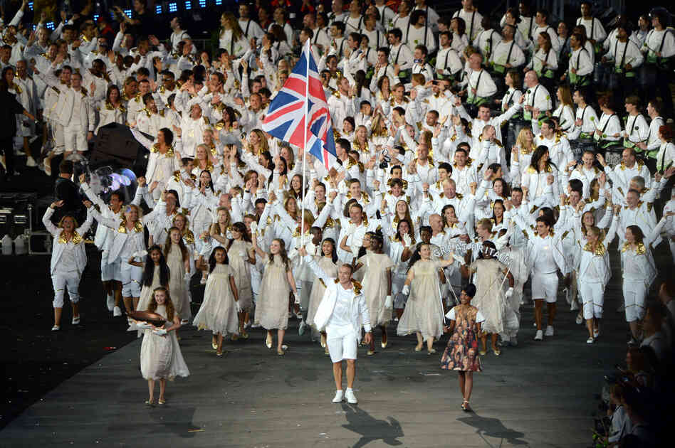 Sir Chris Hoy of the Great Britain Olympic cycling team carries his country's flag during the opening ceremony.