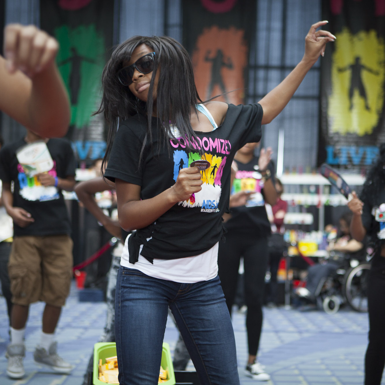 Music and dancing filled the Global Village from morning to evening, often spilling out into other parts of the convention center. Khadijan High, a member of the Dance Institute of Washington, performed a hip-hop routine for The Condom Project.