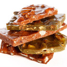 Nut brittles from the Las Cruces Candy Company are studded with pecans, pistachios and almonds, and infused with New Mexico's signature chili peppers — both green and red.