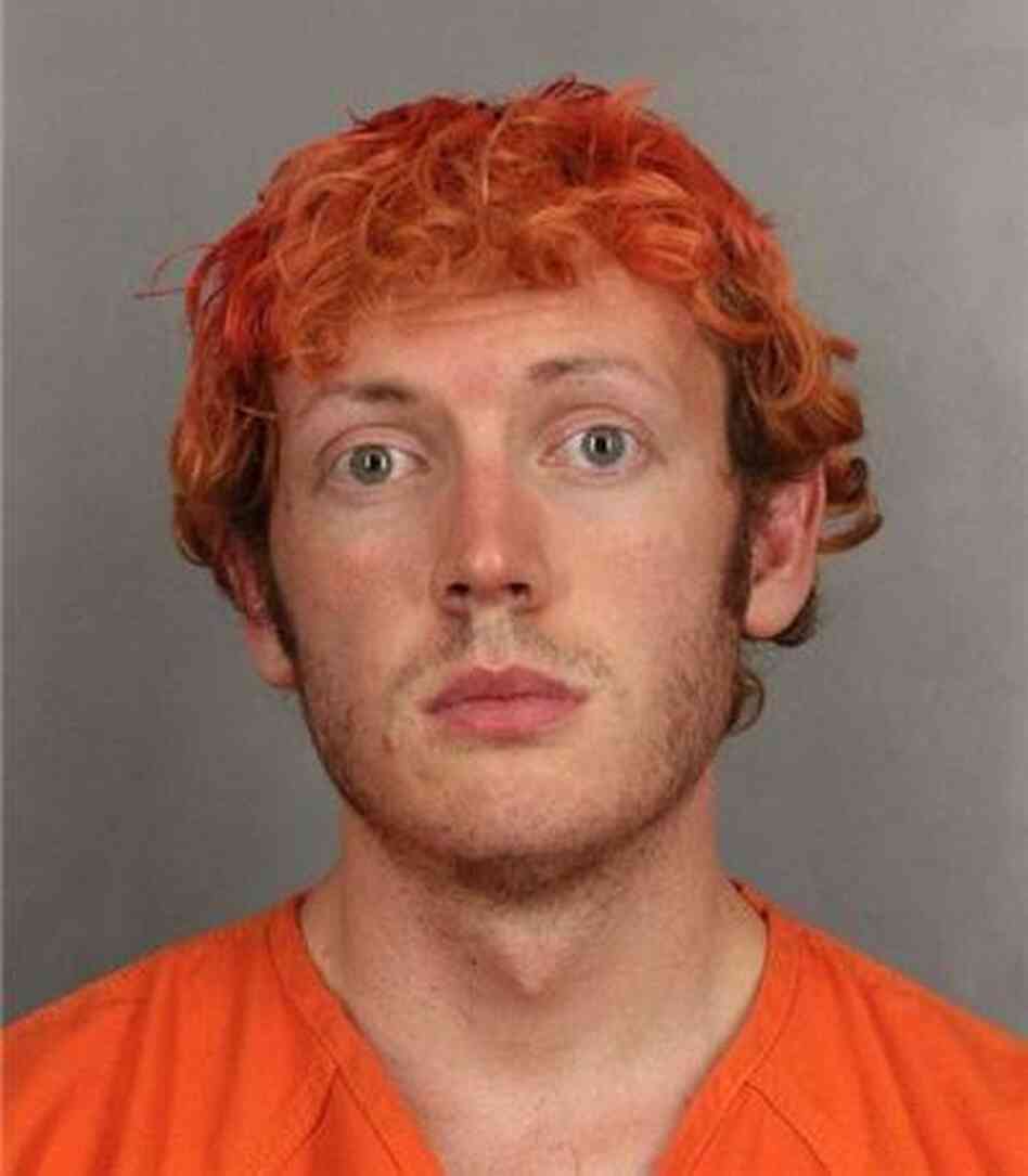 James Holmes in a photograph taken by police during his booking.