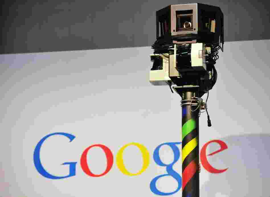 The camera mounted on a Google Street View car used to photograph whole streets obscures part of the U.S. Internet giant's logo.