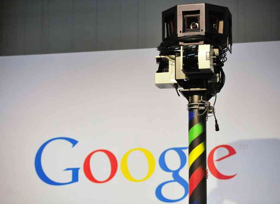 The camera mounted on a Google Street View car used to photograph whole streets obscures part of the U.S. Internet giant's logo.