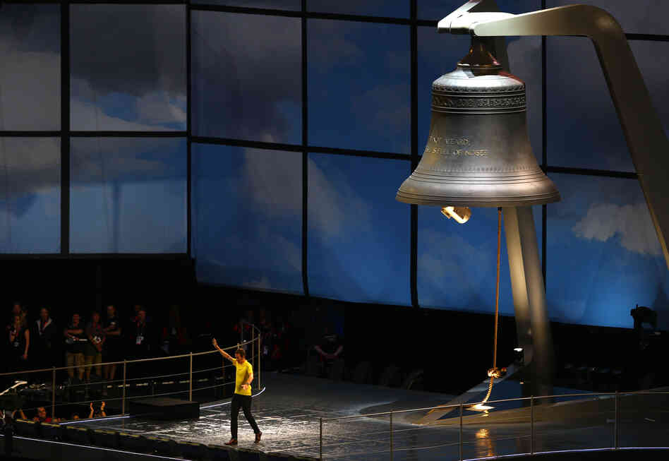 Britain's Bradley Wiggins, who won the Tour de France this year, rings the 23-ton Olympic bell, which was manufactured by the same company that made Big Ben.