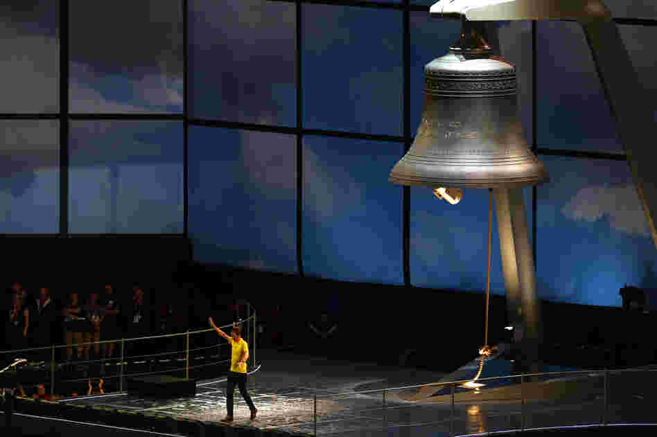 Britain's Bradley Wiggins, who won the Tour de France this year, on stage during the ceremony. The cyclist rang the 23-ton Olympic bell, which was manufactured by the same company that made Big Ben.
