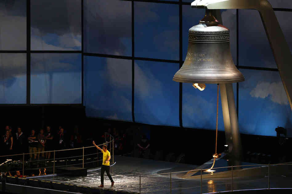 Britain's Bradley Wiggins, who won the Tour de France this year, on stage during the ceremony. The cyclist rang the 23-ton Olympic bell, which was manufactured by the same company that made Big Ben.