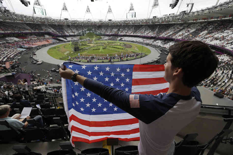 Ryan Musgrave of Chicago holds a U.S. flag.