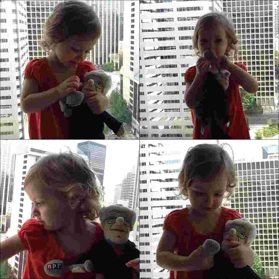 Paloma Isabel with her Carl Kasell Little Thinker Doll Paloma Isabel with her Carl Kasell Little Thinker Doll