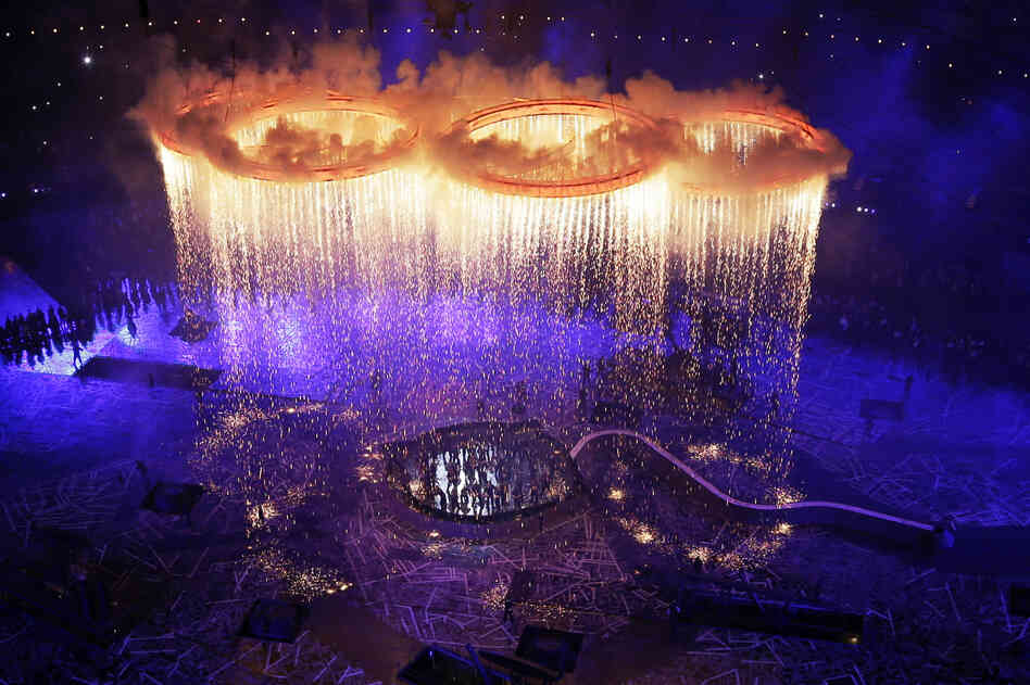 The Olympic Rings are assembled in the 80,000-seat Olympic Stadium.
