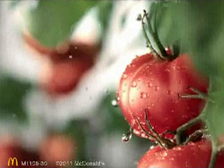Tomatoes getting a splash of water reinforces the notion that McDonald's food is wholesome in China, as seen in this video screengrab. Tomatoes getting a splash of water reinforces the notion that McDonald's food is wholesome in China, as seen in this video screengrab.