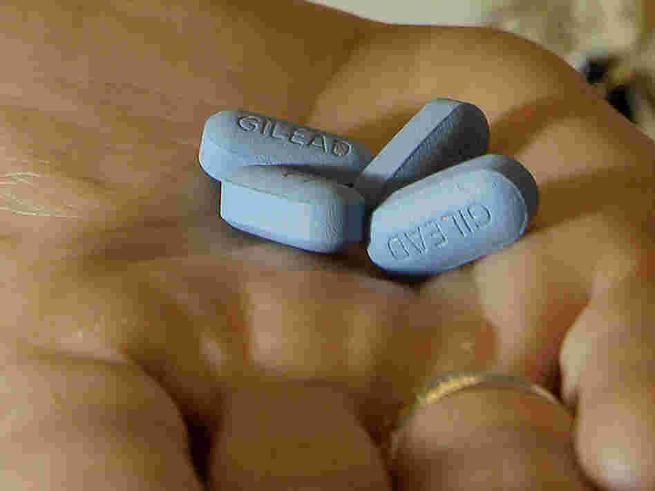 Dr. Lisa Sterman holds Truvada pills at her office in San Francisco. The drug was recently approved by the Food and Drug Administration to prevent infection in people at high risk of infection with HIV. The pill, already used to treat people with HIV, also helps reduce the odds they will spread the virus.
