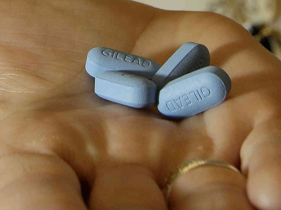 Dr. Lisa Sterman holds Truvada pills at her office in San Francisco. The drug was recently approved by the Food and Drug Administration to prevent infection in people at high risk of infection with HIV. The pill, already used to treat people with HIV, also helps reduce the odds they will spread the virus.
