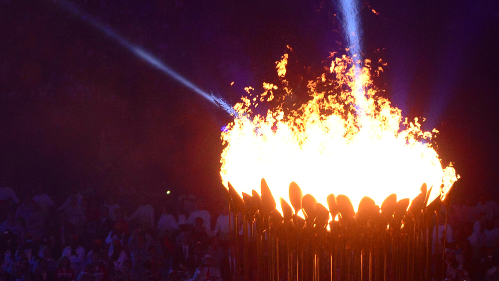 The Olympic Flame is lit during the opening ceremony of the London 2012 Olympic Games at the Olympic Stadium.