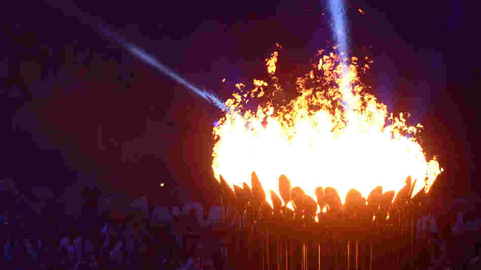 The Olympic Flame is lit during the opening ceremony of the London 2012 Olympic Games at the Olympic Stadium.