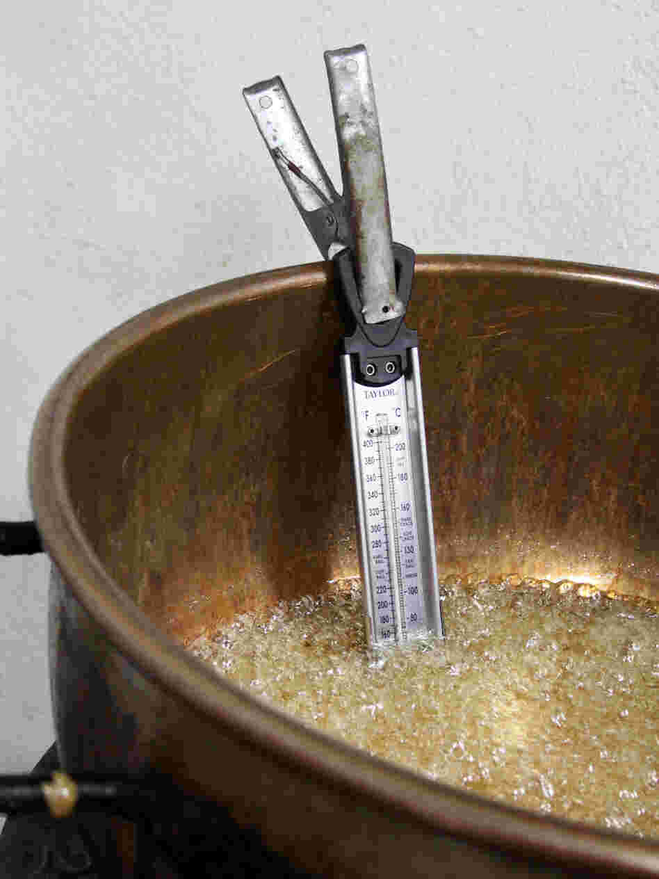 Brittle starts out by heating a mix of sugar and water. Once it reaches 280 degrees, chili powder, nuts and other ingredients are added.