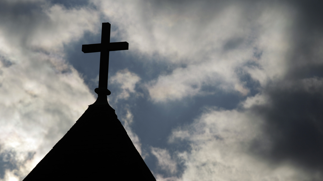 The cross on the steeple of St. Francis Xavier Catholic Church in Henryville, Ind. A recent Gallup poll says only 44 percent of Americans have "great confidence" in organized religion.