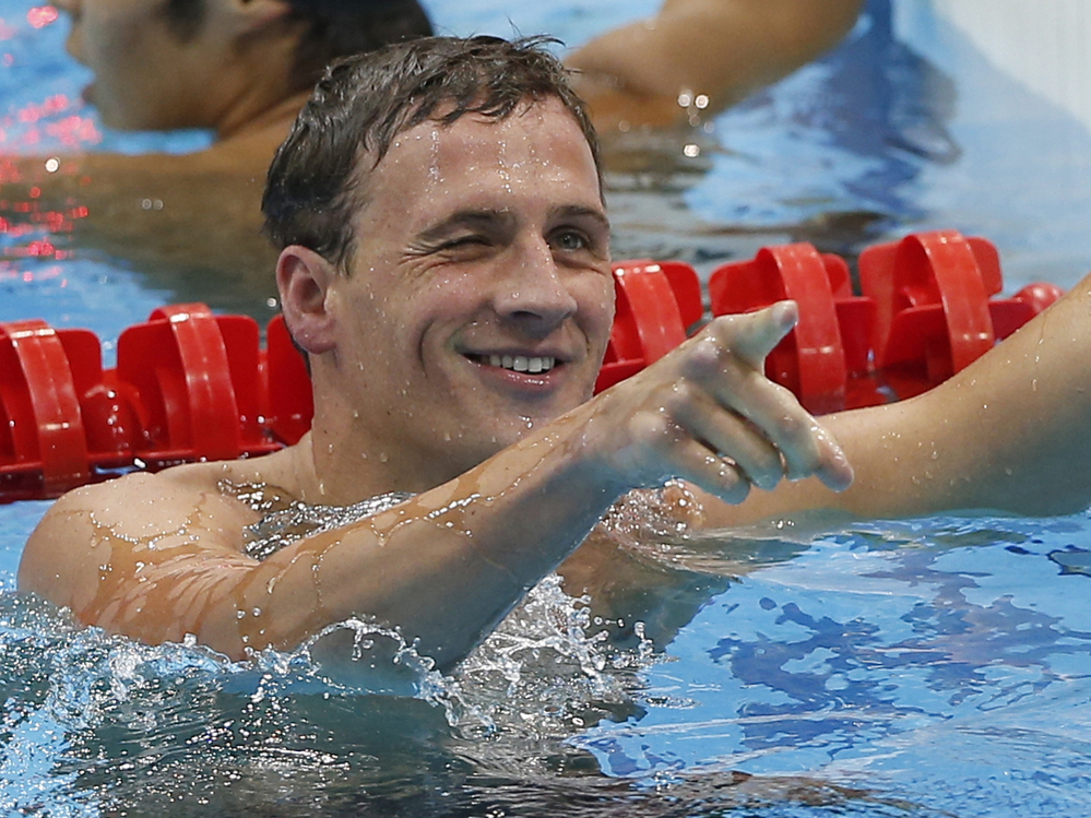 United States' Ryan Lochte reacts after finishing first in the men's 400-meter individual medley swimming final at the Aquatics Centre in the Olympic Park. Lochte won the first U.S. gold medal at the 2012 Summer Games.