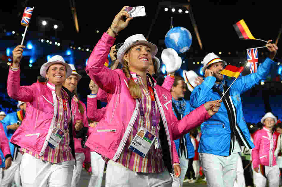 Members of the German Olympic team parade through the Olympic stadium in London during the opening ceremony on Friday. 