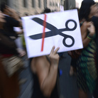 Government employees demonstrate against the Spanish government's austerity measures in Madrid, on Friday. The economic situation has forced some Spaniards to leave the country for work.