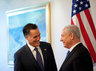Republican presidential candidate Mitt Romney meets Israeli Prime Minister Benjamin Netanyahu before a meeting at the prime minister's office Sunday in Jerusalem, Israel. Republican presidential candidate Mitt Romney meets Israeli Prime Minister Benjamin Netanyahu before a meeting at the prime minister's office Sunday in Jerusalem, Israel.