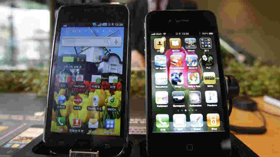 Samsung Electronics' Galaxy S (left) and Apple's iPhone 4 are displayed at the headquarters of South Korean mobile carrier KT. Apple claims some of Samsung's designs violate its patents. Samsung Electronics' Galaxy S (left) and Apple's iPhone 4 are displayed at the headquarters of South Korean mobile carrier KT. Apple claims some of Samsung's designs violate its patents.