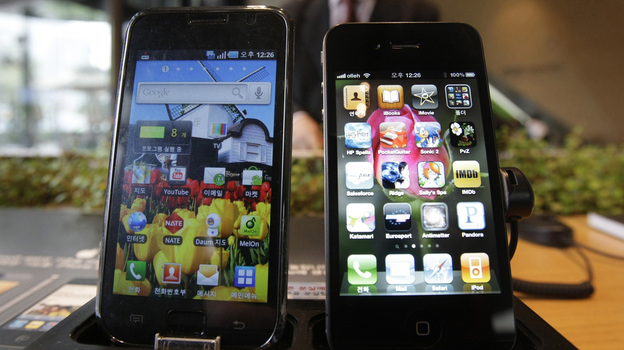Samsung Electronics' Galaxy S (left) and Apple's iPhone 4 are displayed at the headquarters of South Korean mobile carrier KT. Apple claims some of Samsung's designs violate its patents. Samsung Electronics' Galaxy S (left) and Apple's iPhone 4 are displayed at the headquarters of South Korean mobile carrier KT. Apple claims some of Samsung's designs violate its patents.
