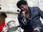Charles Bradley and His Extraordinaires perform at the Fort Stage at the Newport Folk Festival.