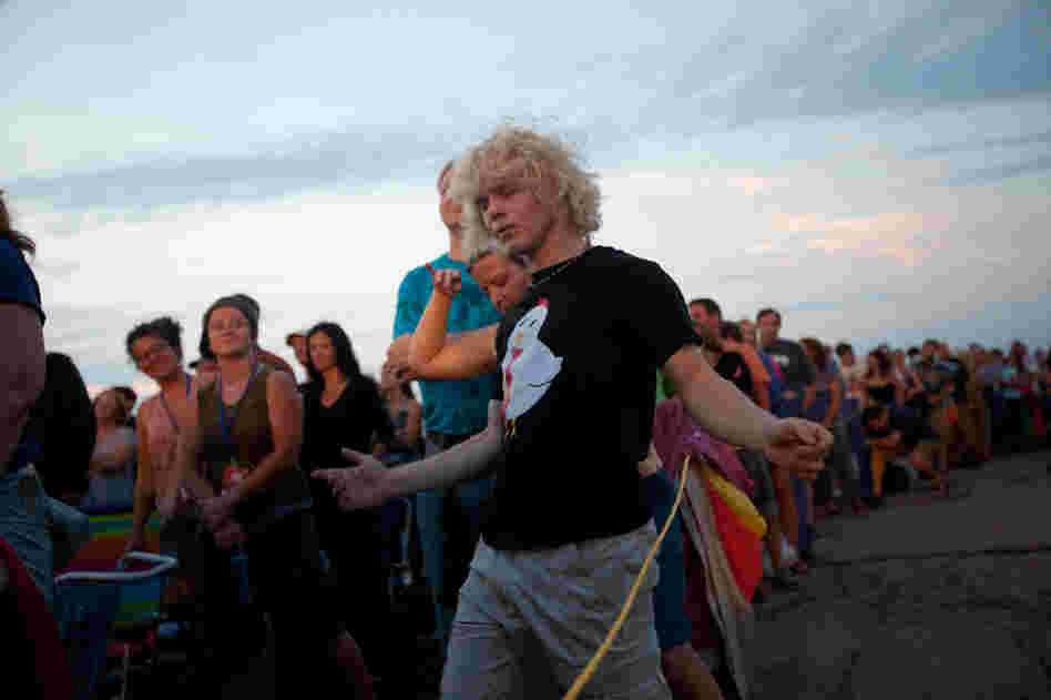 Michael Dale of Amherst, Mass., dances during Wilco.
