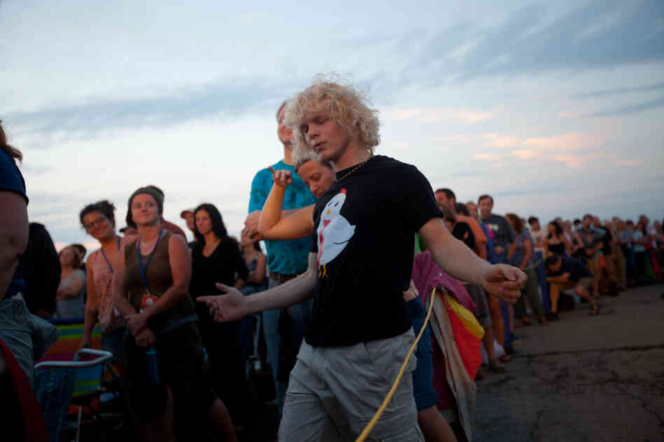 Michael Dale of Amherst, Mass., dances during Wilco.