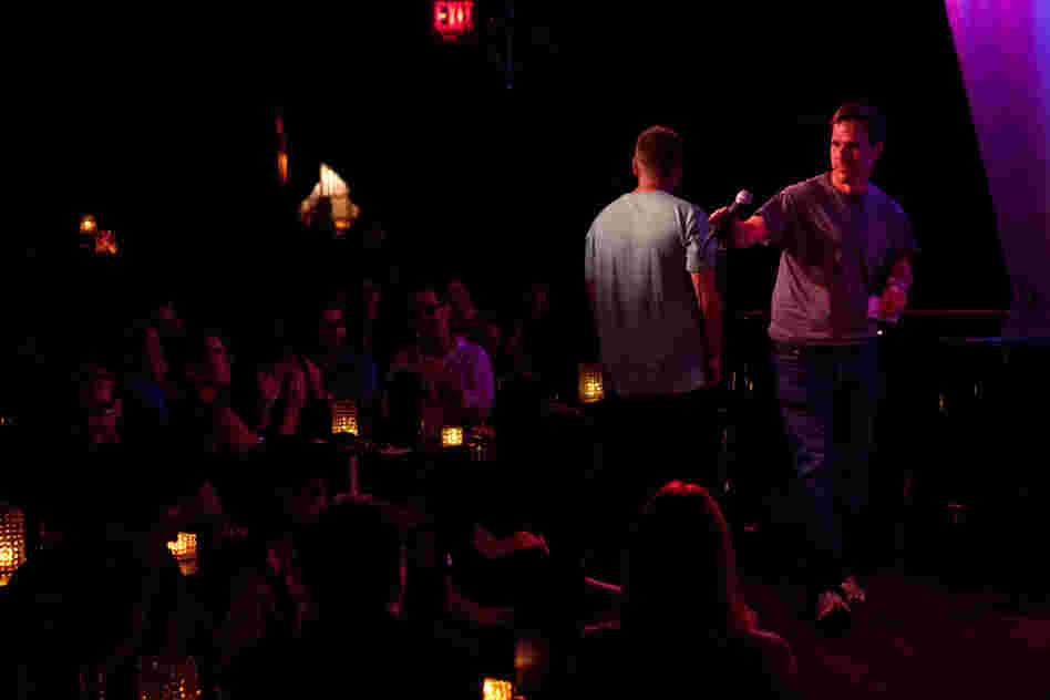 Amateur comedian Robert Lynch takes the mic at the Metropolitan Room in New York City on July 21. Lynch is also an evolutionary anthropologist who is studying what laughter reveals about us.