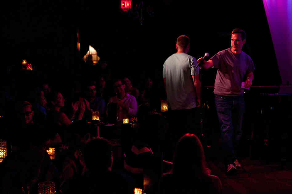 Amateur comedian Robert Lynch takes the mic at the Metropolitan Room in New York City on July 21. Lynch is also an evolutionary anthropologist who is studying what laughter reveals about us.