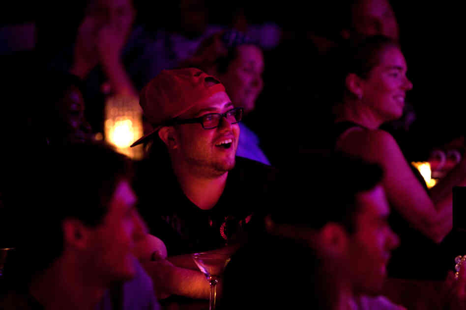 Bruno Fava laughs at a joke at the Metropolitan Room. Lynch finds there's a connection between self-deception and laughter.