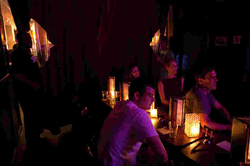Lynch, far right, sits with fellow comedians waiting to go on stage at the Metropolitan Room. He says his research helps him to be a better comic.