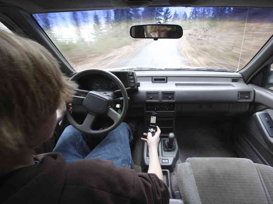 Drivers under 25 are more likely to send text messages and make calls behind the wheel. They're also less able to handle distractions while driving.