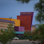 The Century 16 movie theatre is seen from a memorial setup across the street on July 28, in Aurora, Colorado.