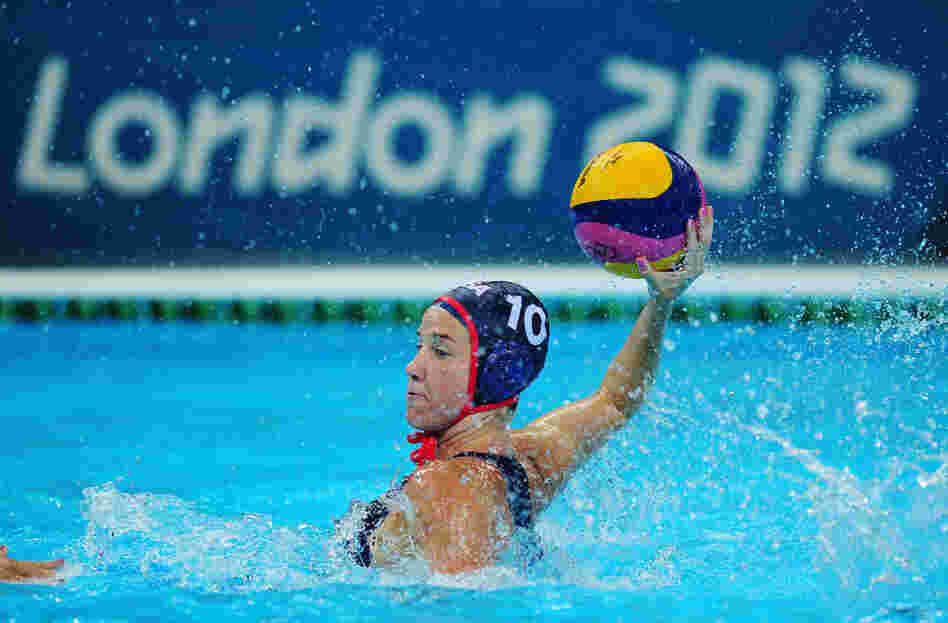 Kelly Rulon of the United States looks for a pass during the women's water polo preliminary match against Hungary. The U.S. won the match. 