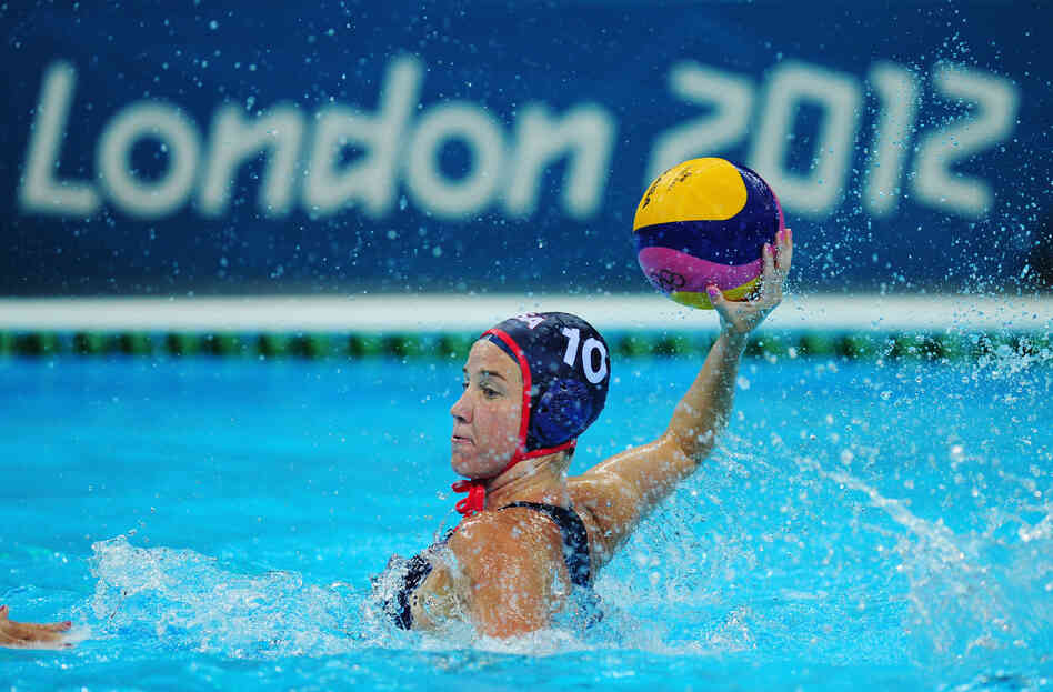 Kelly Rulon of the United States looks for a pass during the women's water polo preliminary match against Hungary. The U.S. won the match. 