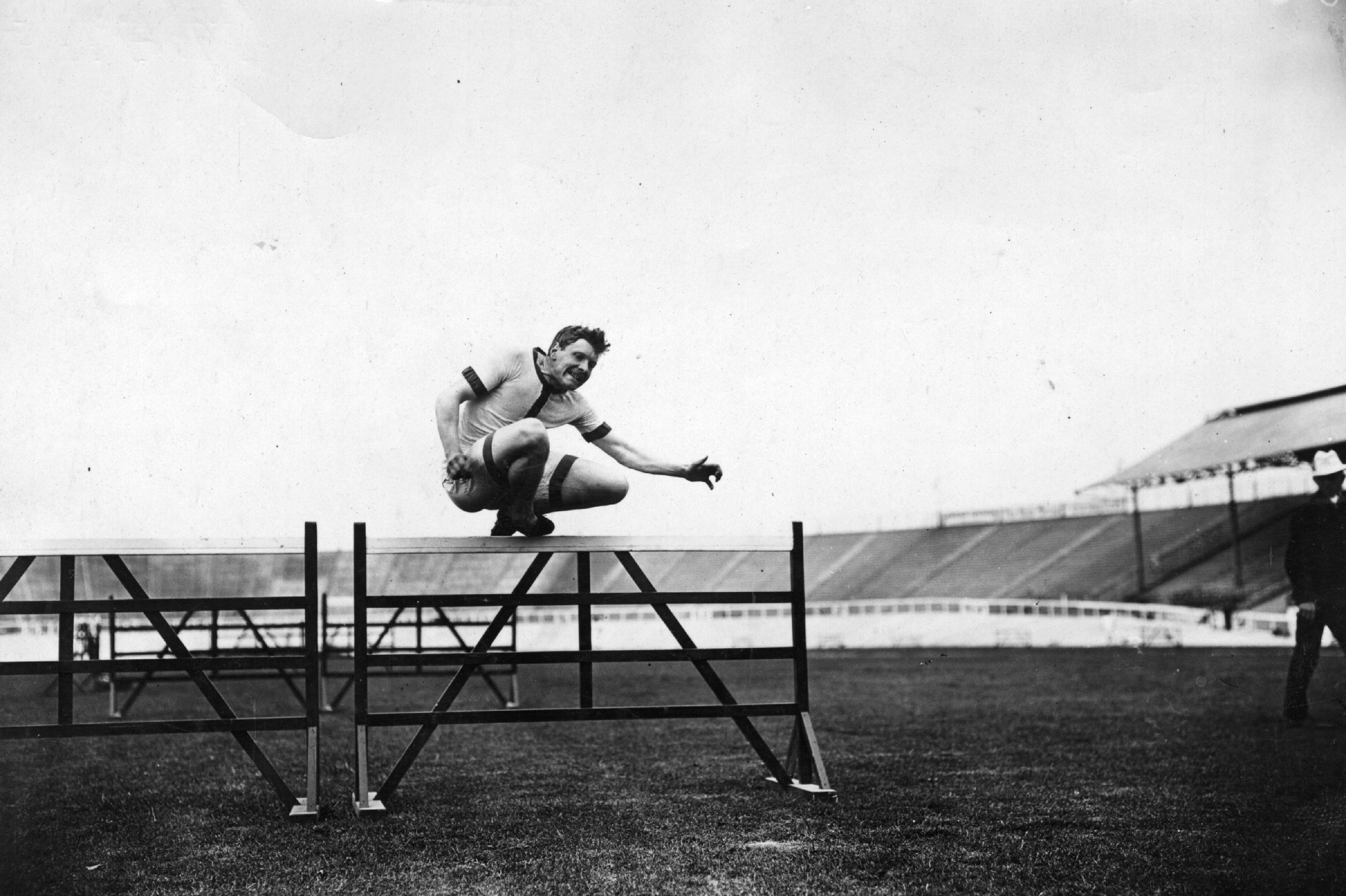 Eric Hussey of Great Britain training for hurdles.