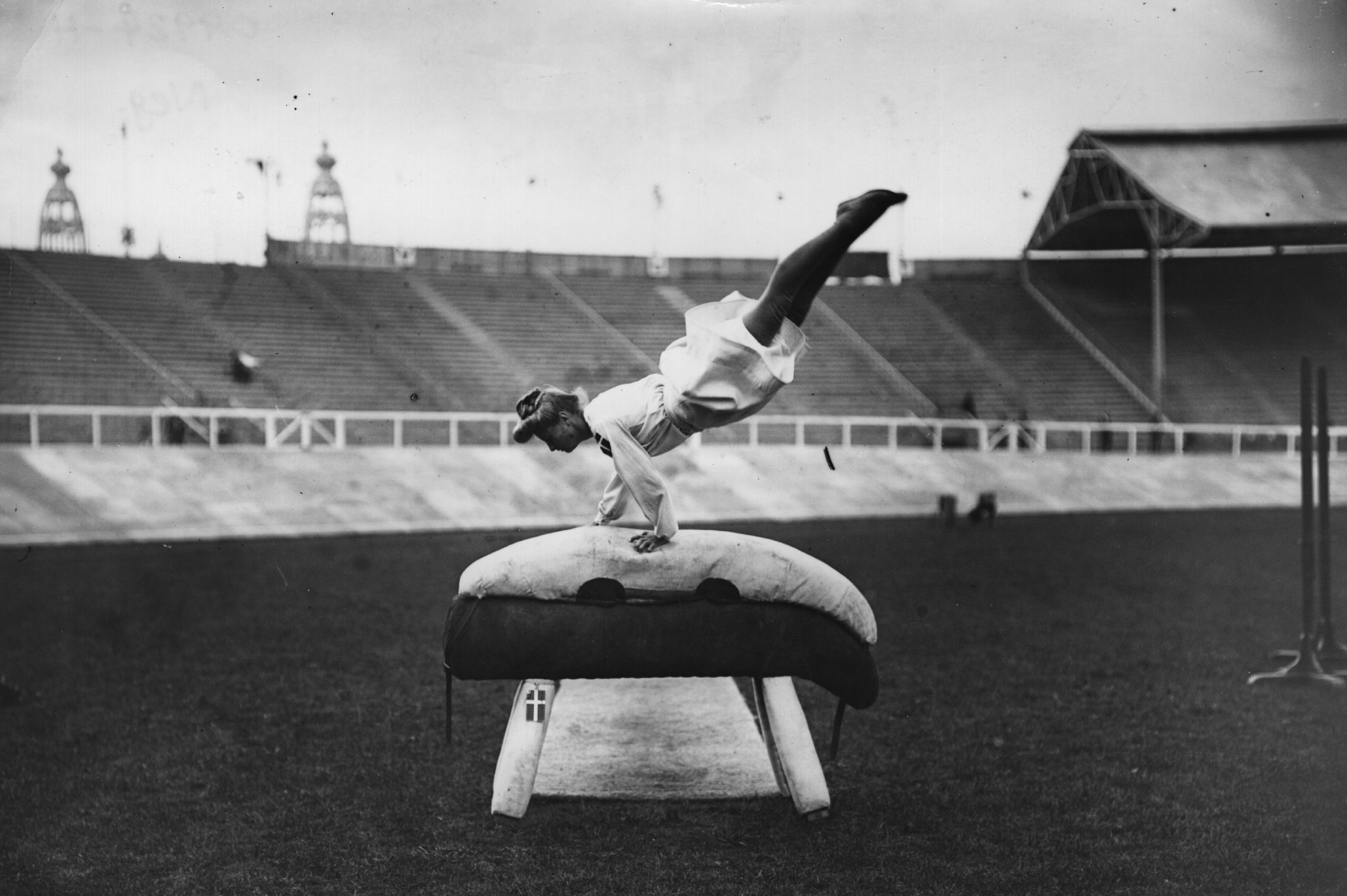 July 1908: A Danish gymnast performing on a gymnastic pommel horse at the 1908 London Olympics. (Photo by Topical Press Agency/Getty Images)
