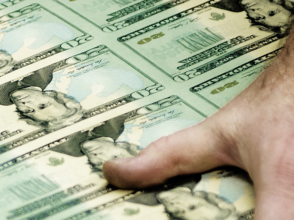 The Fed doesn't literally print money, but it can create more if it wants to try to spur the economy.