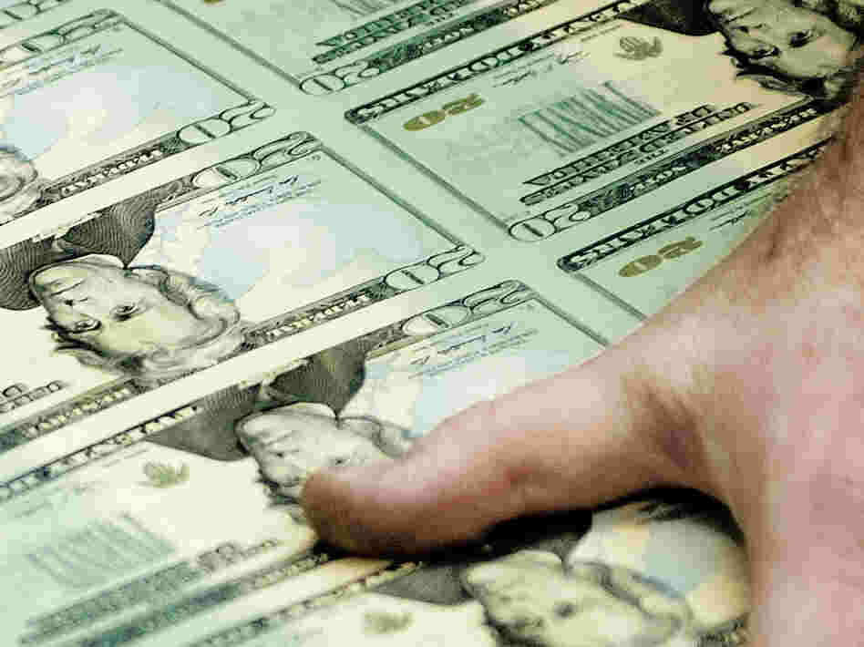 The Fed doesn't literally print money, but it can create more if it wants to try to spur the economy.