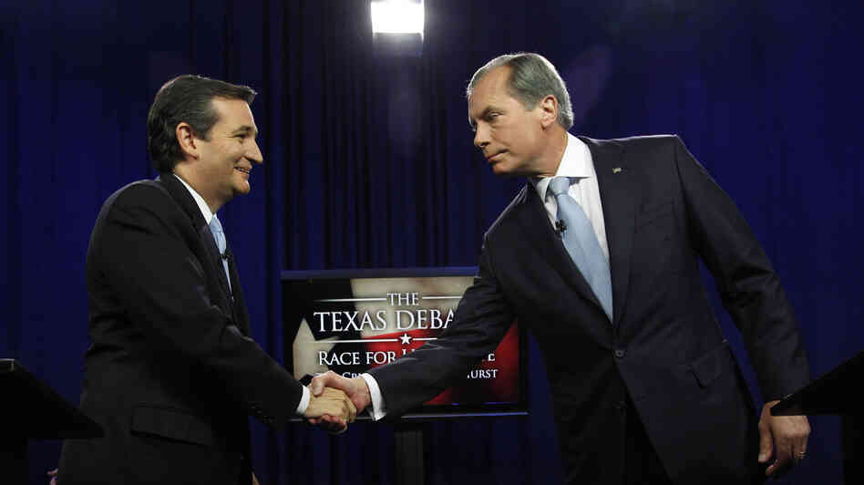 Ted Cruz, left, and David Dewhurst shake hands before their Republican Senate debate in Dallas on June 22.