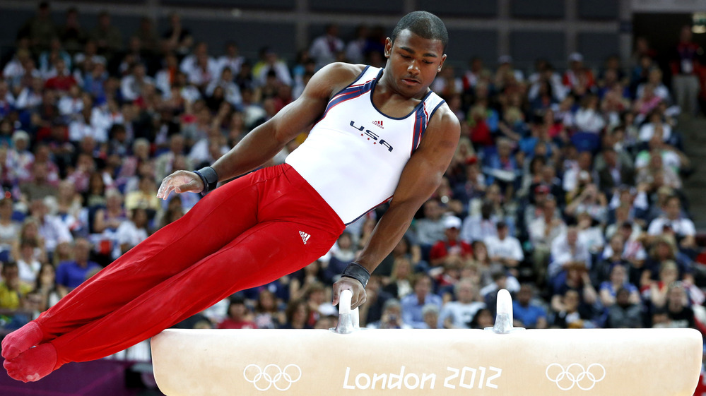 U.S. gymnast John Orozco runs through his pommel horse routine, in the Olympic men's team final at the 02 North Greenwich Arena in London. The Americans fell short of the promise they established in qualifying rounds.