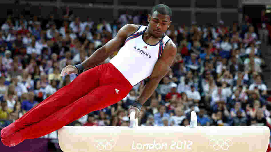 U.S. gymnast John Orozco runs through his pommel horse routine, in the Olympic men's team final at the 02 North Greenwich Arena in London. The Americans fell short of the promise they established in qualifying rounds.
